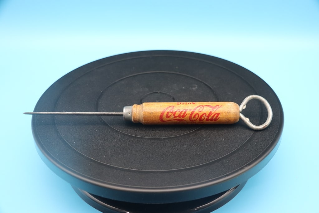 VINTAGE COCA COLA: A VINTAGE COCA COLA ICE PICK AND BOTTLE OPENER. GOOD CONDITION.