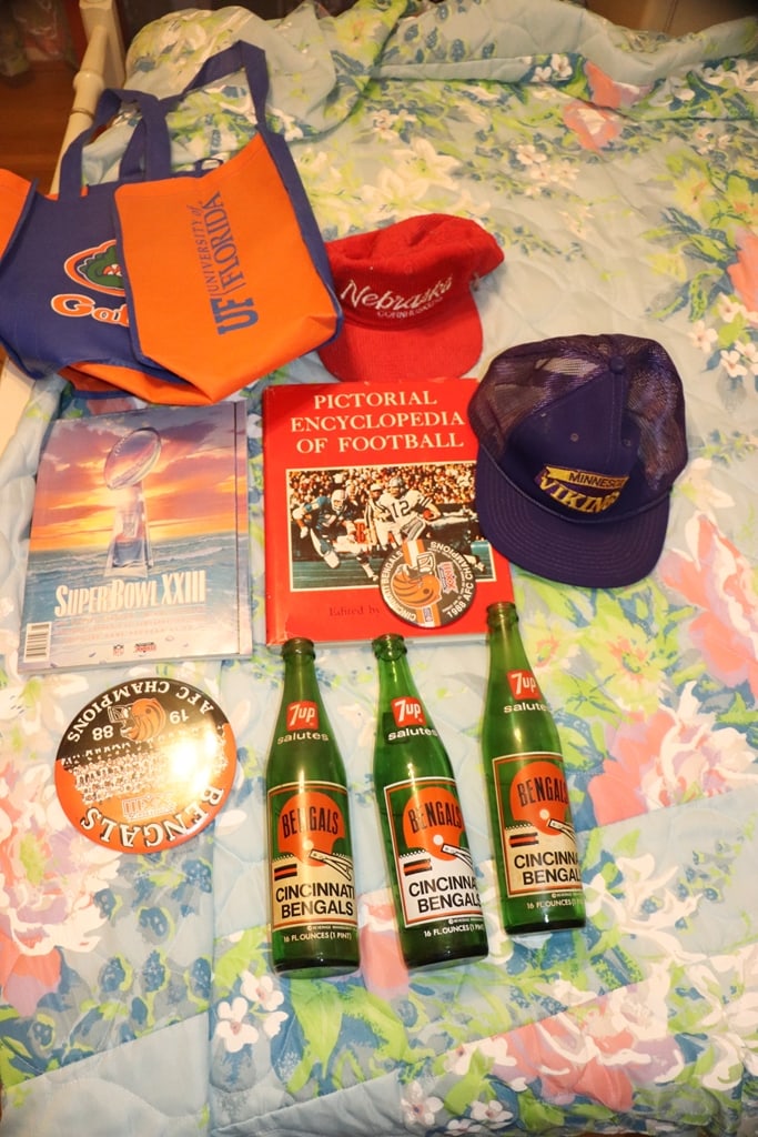 FOOTBALL MEMORABILIA: A VINTAGE FOOTBALL MEMORABILIA LOT WITH BENGALS ITEMS.