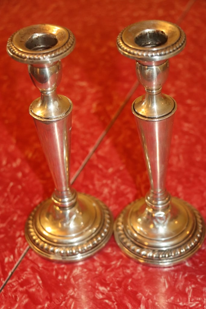 VINTAGE STERLING: A VINTAGE PAIR OF FRANK WHITING WEIGHTED STERLING CANDLE HOLDERS. VERY GOOD CONDITION.