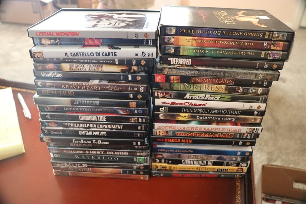 DVD MOVIES: A GROUP OF 40 ACTION/DRAMA DVD MOVIES. VERY GOOD CONDITION.