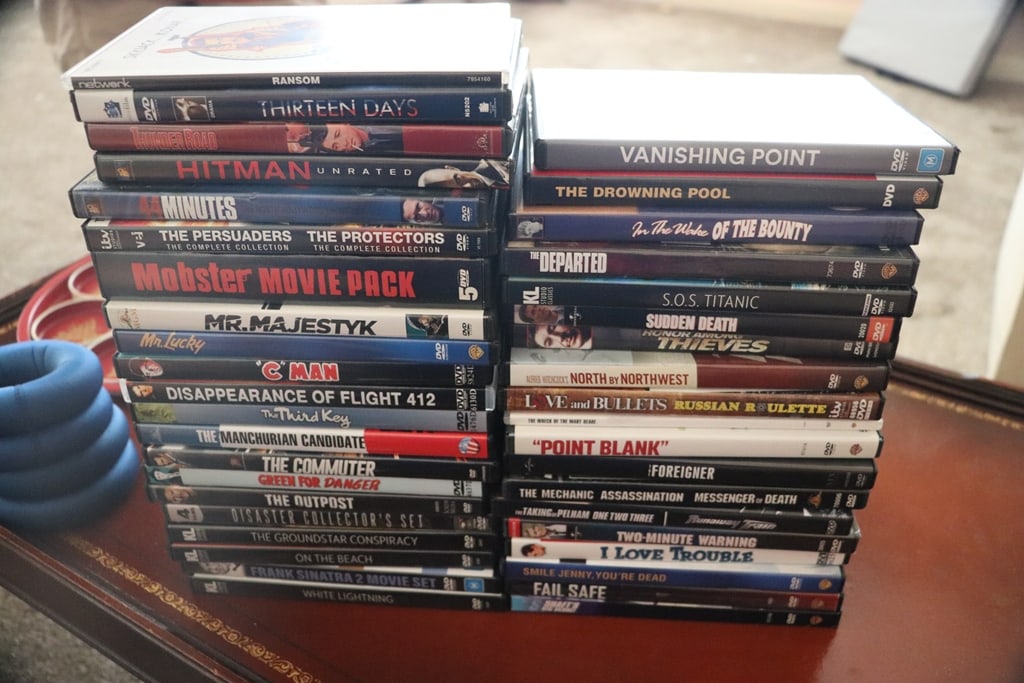 DVD MOVIES: A GROUP OF 40 ACTION DVD MOVIES. VERY GOOD CONDITION.
