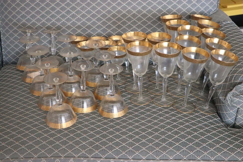 VINTAGE LOTUS GLASSES: A GROUP OF VINTAGE LOTUS GOLD RIMMED GLASSES. VERY GOOD COPNDITION.