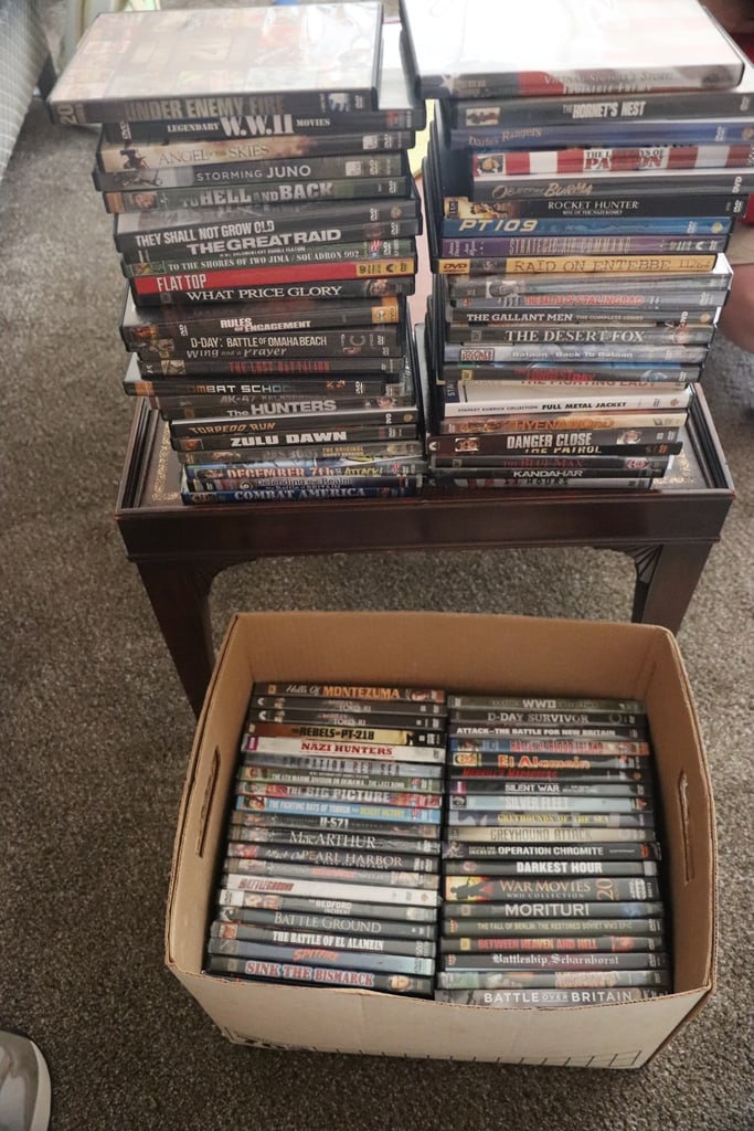 DVD MOVIES: A BOX OF WAR MOVIES/SHOWS. VERY GOOD CONDITION.