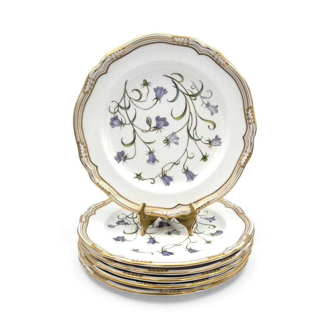 Spode Campanula - Salad Plates, Set of 6: The Spode Campanula salad plates, set of 6 are vintage pieces made of bone china in the United Kingdom. It features a floral pattern in blue and purple hues on white. Manufactured between 1981-2001, t