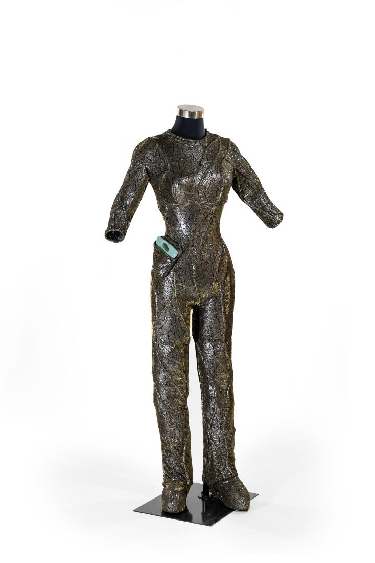 Ah'Len Gold costume w/prop: Having encountered an alien ship cloaked behind them, the “Enterprise” crew decides to help them repair their engines by sending “Commander Tucker” (Connor Trinneer) over to help. While aboard