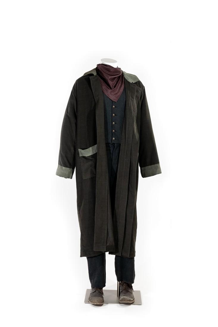 Micky: An 8 piece costume worn by Phil Burke in his role of Micky McGinnes in the episode "Gambit". The costume includes Micky's suspenders, pants, jacket, vest, button-up shirt, silk scarf and a pair of sho