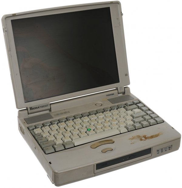 Yinsen's Hero Laptop Computer: Laptop Yinsen and Tony Stark use to initialize the systems in the Mark I suit. Production labeled this as the hero laptop used by Shaun Toub. Heavily weathered by the Prop Department. Laptop does not 