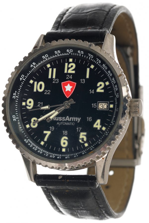 Omar's Hero Wristwatch: Wristwatch worn by Ten Rings member Omar with the RussArmy logo on the front. Production noted this as the watch worn by Fahim Fazli. Watch does function and measures 8" long.