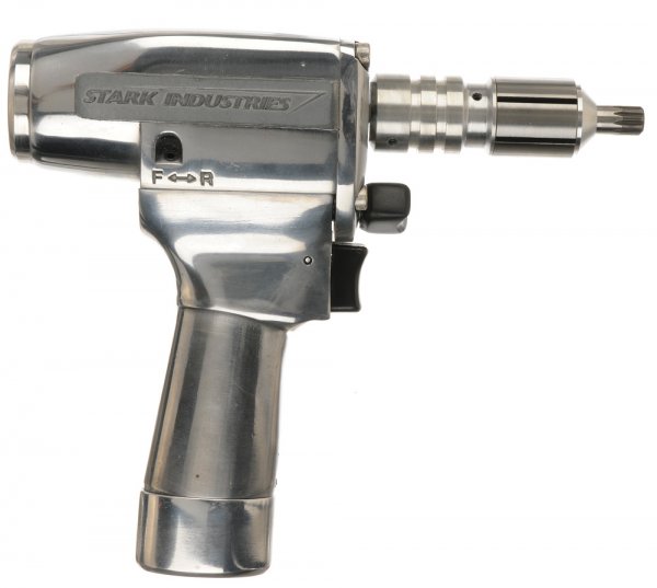 Tony Stark's Hero Power Screwdriver: Stark Industries power screwdriver tool Tony uses to attach the left arm section of the Mark II suit when he fits it for the first time. Production noted this as the hero power screwdriver stand used 