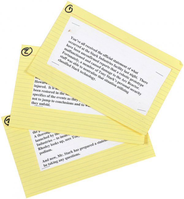 Rhodes' Reveal Scene Cue Cards: Screen used cue cards held by Lt Colonel James Rhodes and left on the podium when he gives the official announcement and introduces Tony Stark during the press conference. Production labeled these as