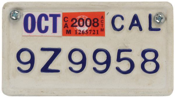 Hero Motorcycle License Plate: Burned and twisted California license plate "1E49948" seen on the transit bus which is destroyed when Iron Monger throws Iron Man into and then launches a shoulder mounted rocket at resulting in a mas