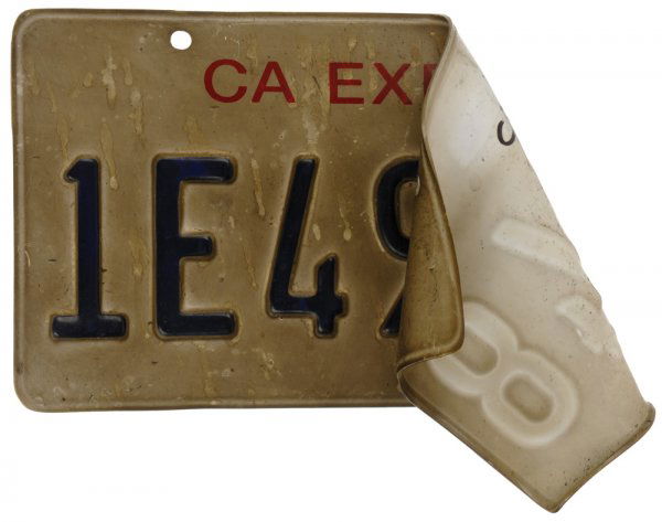 Hero Transit bus license Plate: "Burned and twisted California license plate ""1E49948"" seen on the transit bus which is destroyed when Iron Monger throws Iron Man into and then launches a shoulder mounted rocket at resulting in a