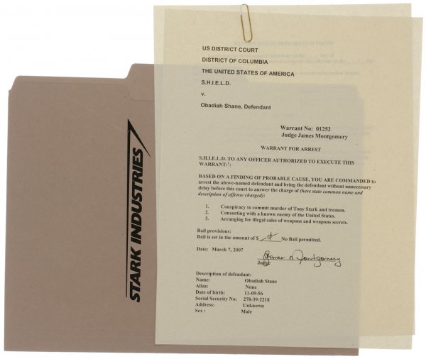 Stark Industries Folder Containing Signed S.H.I.E.: Official S.H.I.E.L.D. arrest warrant for Obadiah Stane, otherwise known as the Iron Monger. For conspiracy to commit murder and treason and arranging for illegal sales of weapons the S.H.I.E.L.D obtai