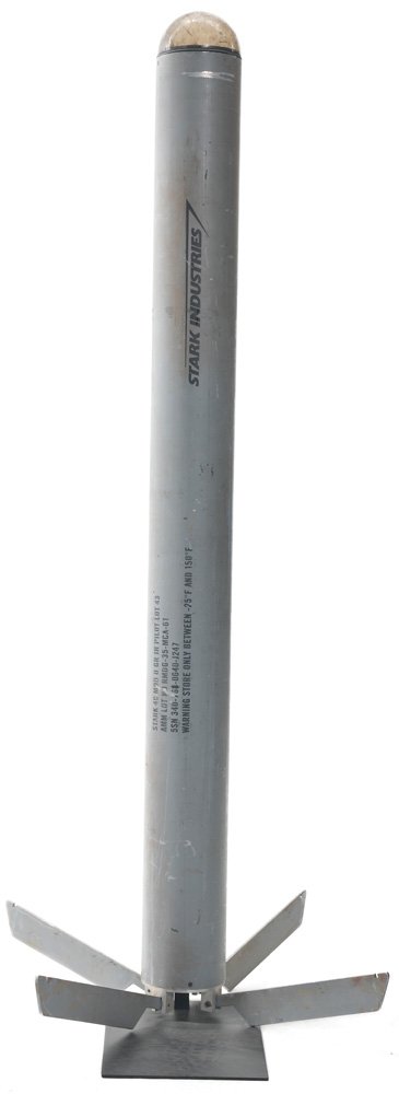 Stark Industries Laser Guided Missile, Guidance Sy: Stark Industries long gray laser guided missile with plastic dome head. Included with the missile are a backup guidance system and palladium chip. Missiles and parts like these were seen scattered thr