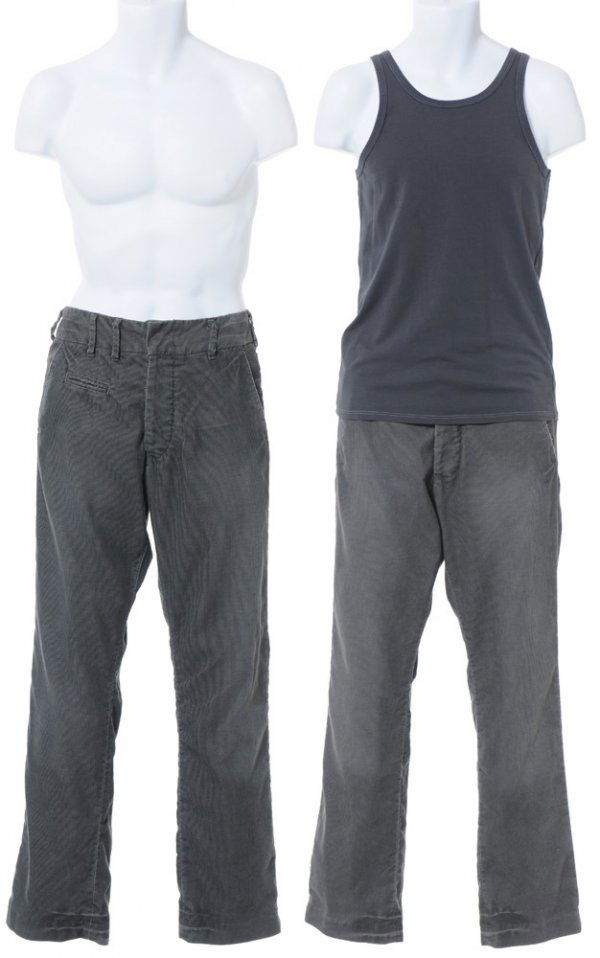 Tony Stark's Flying Test Wear: The outfit Tony Stark wears when first testing out the thrusters and jet boots in his workshop. Production noted this hero outfit was worn by Robert Downey Jr. A dark gray tank-top size medium with tw