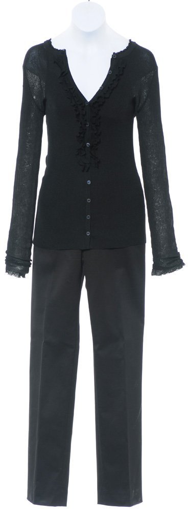 Pepper Potts' Outfit: The outfit Pepper Potts wears in a deleted scene while on the phone with Agent Colson from S.H.I.E.L.D. Production noted this hero outfit was worn by Gwyneth Paltrow. A black half-sleeve sweater with 