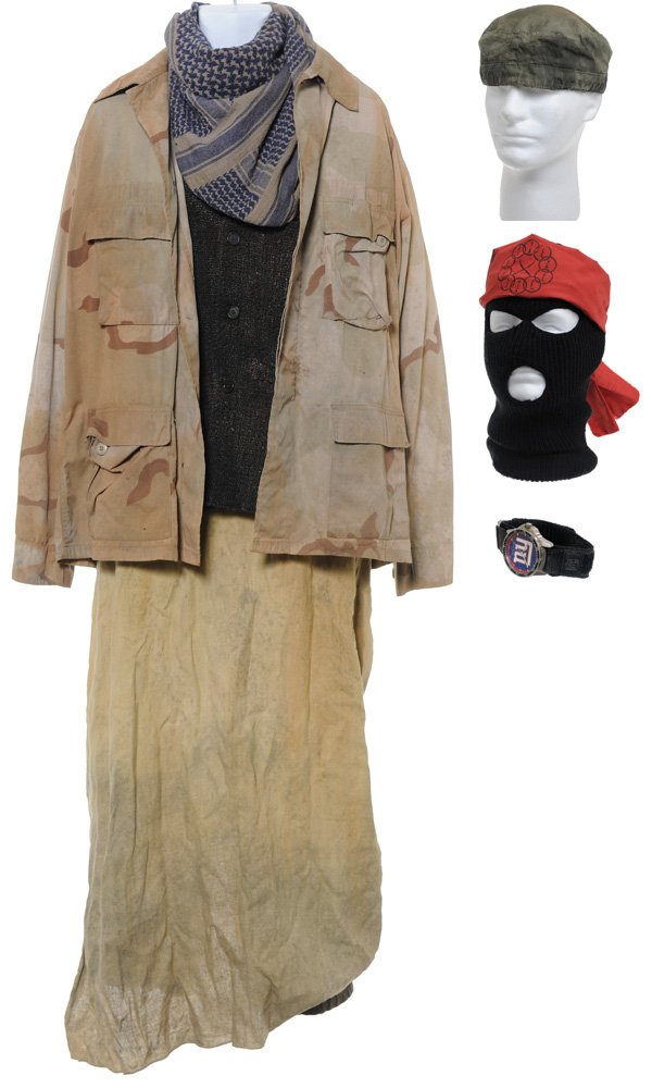 Ahmed's Outfit: The outfit Ahmed wears during Tony Stark's incarceration at the insurgent camp. Hero outfit was worn by Ahmed Ahmed. A desert camo BDU blouse size extra large, brown wool knitted sweater vest size M, 