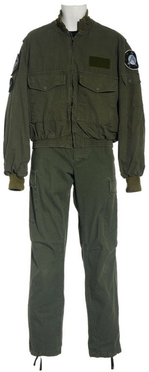 Mitchell's Green BDU from "Origin": Production Description: Green BDU uniform worn by actor Ben Browder as "Cameron Mitchell" on Stargate SG-1. Mitchell led the SG-1 team through the last two years of the series after recovering from an