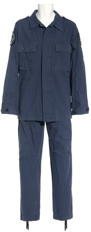 Mitchell's Blue BDU from "Origin": Production Description: Blue BDU uniform worn by actor Ben Browder as "Cameron Mitchell" in the Stargate SG-1 Season Nine episode, "Origin". Mitchell led the SG-1 team through the last two years of th