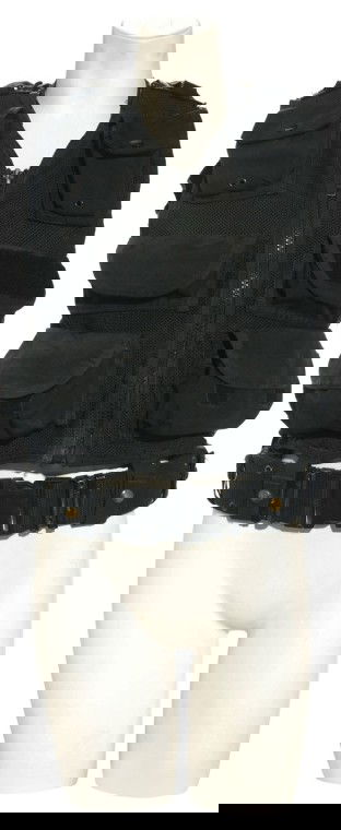 Vala's Tactical Vest with Belt: Production Description: Tactical vest and belt, worn by actress Claudia Black as "Vala Mal Doran" in Stargate SG-1. Vala joined the SG-1 team in Season Ten to help stop the Ori, who had enlisted her n