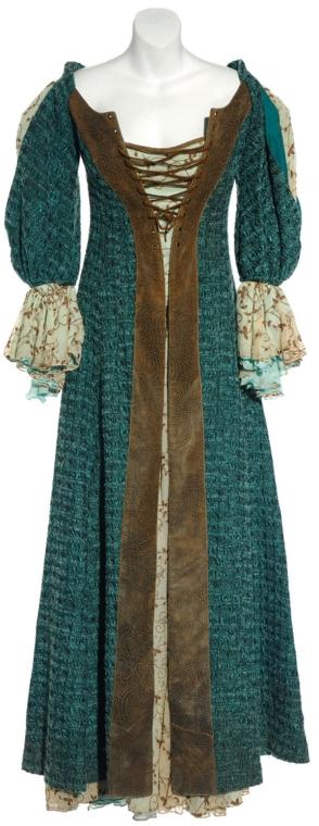 Vala's Villager Costume from "Ark of Truth": Production Description: Costume worn by actress Claudia Black as "Vala Mal Doran" during the production of Stargate SG-1. Vala and the rest of SG-1 entered the Ori galaxy undercover to locate the Ark