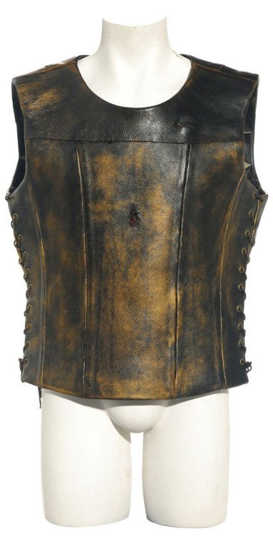 Arkad's Bloody Vest from "Talion": Production Description: Bloody vest worn by actor Craig Fairbrass as "Arkad" in the Stargate SG-1 Season Ten episode, "Talion". Arkad, a follower of the Ori, took vengeance on Teal'c by killing his mo