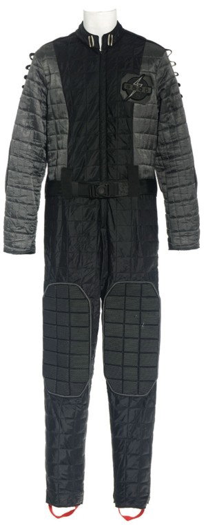 Military Uniform from "Bad Guys": Production Description: Gray jumpsuit worn by an alien military officer in the Stargate SG-1 Season Ten episode "Bad Guys". This was the only episode pitched by actor Ben Browder (which he did with SG