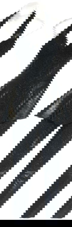 Adria's Costume from "Dominion": Production Description: Costume worn by actress Morena Baccarin as "Adria" in the Stargate SG-1 Season Ten episode, "Dominion". Adria was conceived by the Ori (in the body of Vala Mal Doran) to be the