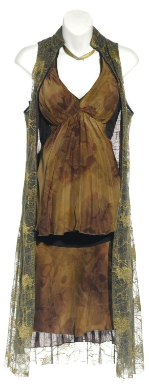 Teyla's Costume from "Midway": Production Description: Costume worn by actress Rachel Luttrell as "Teyla Emmagan" in the Stargate Atlantis Season Four episode, "Midway". The leader of the Athosian tribe, Teyla gave up a life among 