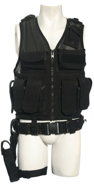 Beckett's Tactical Vest: Production Description: Tactical vest with belt and holster, worn by actor Paul McGillion as "Carson Beckett" in Stargate Atlantis. Beckett was a recurring character from Seasons One through Three, an