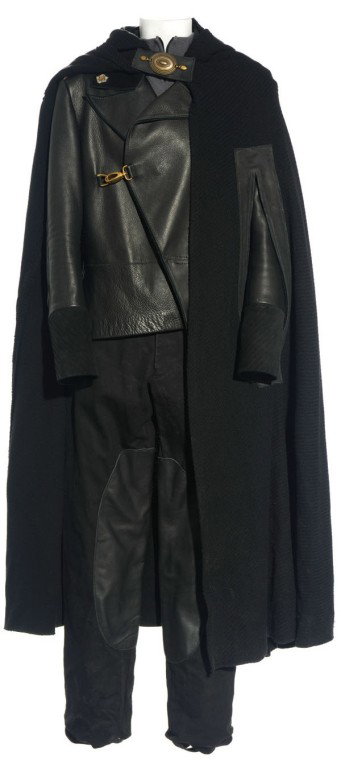 Genii Field Captain Uniform from "Harmony": Production Description: Uniform worn by a Genii field captain in Stargate Atlantis. This updated Genii uniform became prominent in Seasons Four and Five of the series, replacing the olive blouse and t