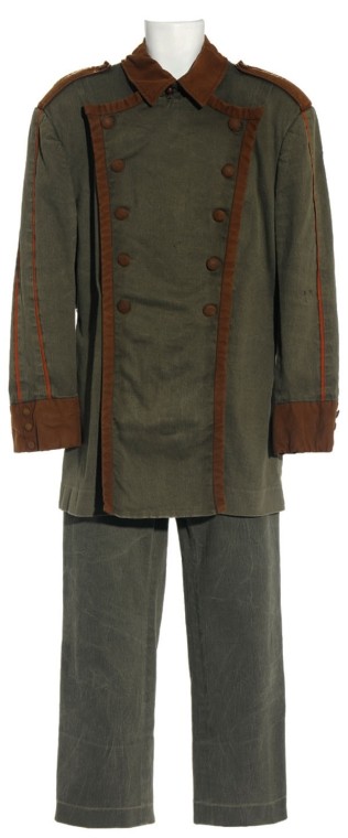 Genii Stunt Soldier from "Harmony": Production Description: Stunt soldier costume worn by a member of the Genii forces in the Stargate Atlantis Season Four episode, "Harmony". The Genii were meant to be an unpredictable "wild card" race