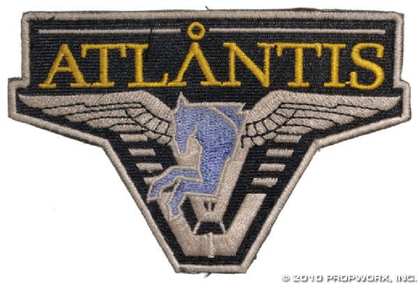 Teyla's Atlantis Patch: Production Description: Hero screen-used Atlantis patch worn by actress Rachel Luttrell as "Teyla Emmagan" in Stargate Atlantis. The leader of the Athosian tribe, Teyla gave up a life among her people