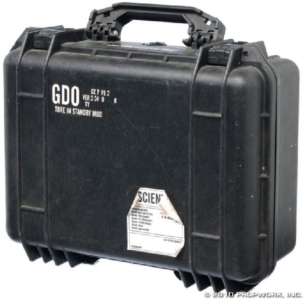Atlantis GDO Case: Production Description: Case used to house numerous GDOs n the production of Stargate Atlantis. This box housed multiple Mark II GDOs that were used throughout the series, both on screen and off. Tech