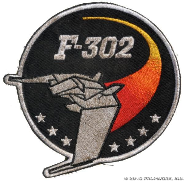 F-302 Patch: Production Description: Patch worn by a member of the F-302 fighter squadron introduced in a briefing with Carter and Young Jack O'Neill in the Stargate SG-1 Season Seven episode, "Fragile Balance". T