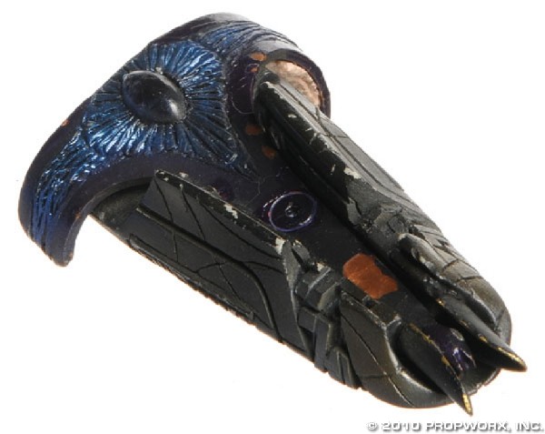 Za'tarc Weapon: Production Description: Device wielded by actress Jeny Cassady as a female bounty hunter in the Stargate SG-1 Season Ten episode, "Bounty". This bounty hunter travels to Earth with this Za'tarc weapon