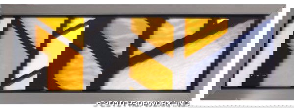 Atlantis Gate Room Stained Glass: Production Description: Stained glass window pane used throughout the production of Stargate Atlantis in the city's gate room. Background elements like this item helped bring the city of the Ancients