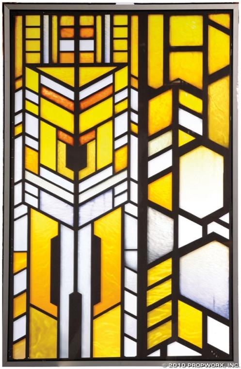 Atlantis Gate Room Stained Glass: Production Description: Stained glass window pane used throughout the production of Stargate Atlantis in the city's gate room. Background elements like this item helped bring the city of the Ancients