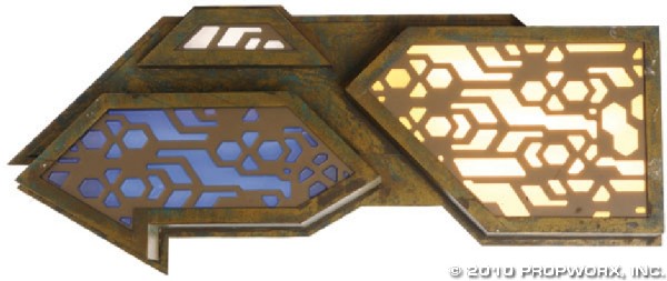 Puddle Jumper Wall Paneling: Production Description: Light-up wall paneling taken from the cockpit of the Puddle Jumper, introduced in Season Two of Stargate Atlantis to enhance the appearance and lighting of the set. Details lik