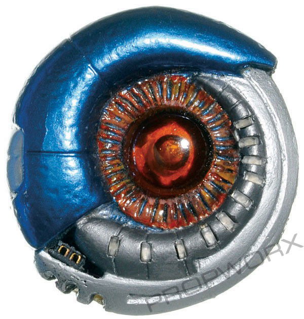 Mimic Device with External Power Supply - Hero: Mimic device worn by a duplicated officer at Stargate Command, seen in the Stargate SG-1 Season Three episode "Foothold." When mysterious aliens break into Stargate Command they use these devices to m