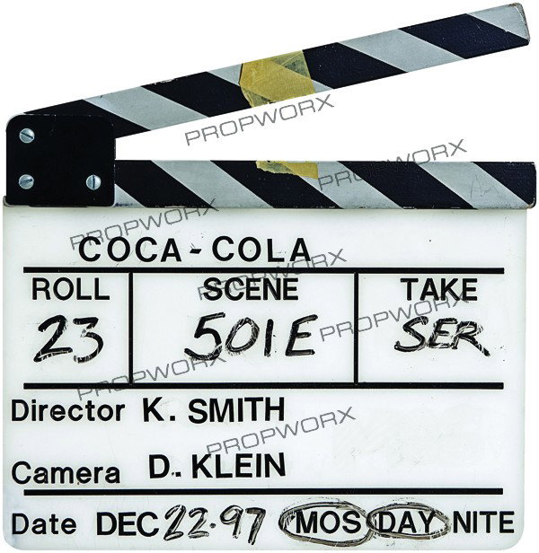 Kevin Smith's Diet Coke Clapper: Production Description: Clapper board used on a Diet Coke commercial directed by Kevin Smith on December 22nd, 1997. Technical Description: Clapper board with "Coca-Cola" as the project name. Written 