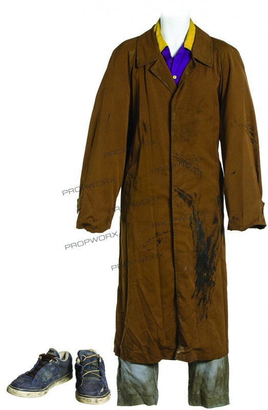 Rufus' Hero Costume: Production Description: This costume was worn by actor Chris Rock while portraying the character Rufus in "Dogma". Production noted these as being the clothes acquired by Rufus after returning to Eart