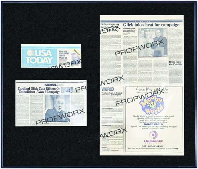 Framed Cardinal Glick News clips: Production Description: Set of three USA TODAY news clippings of Cardinal Glick (George Carlin). These clippings were seen in the film "Dogma." They were framed and placed on the wall of "Jay And Sile