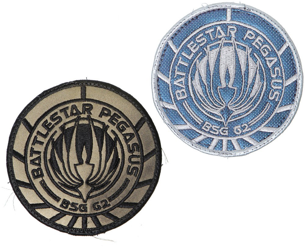 Battlestar Galactica Set of Pegasus Patches: Production Description: The first patch is the standard blue and silver patch used on Battlestar Pegasus crew uniforms. Two styles of this patch were made during the show's run. The first was the same