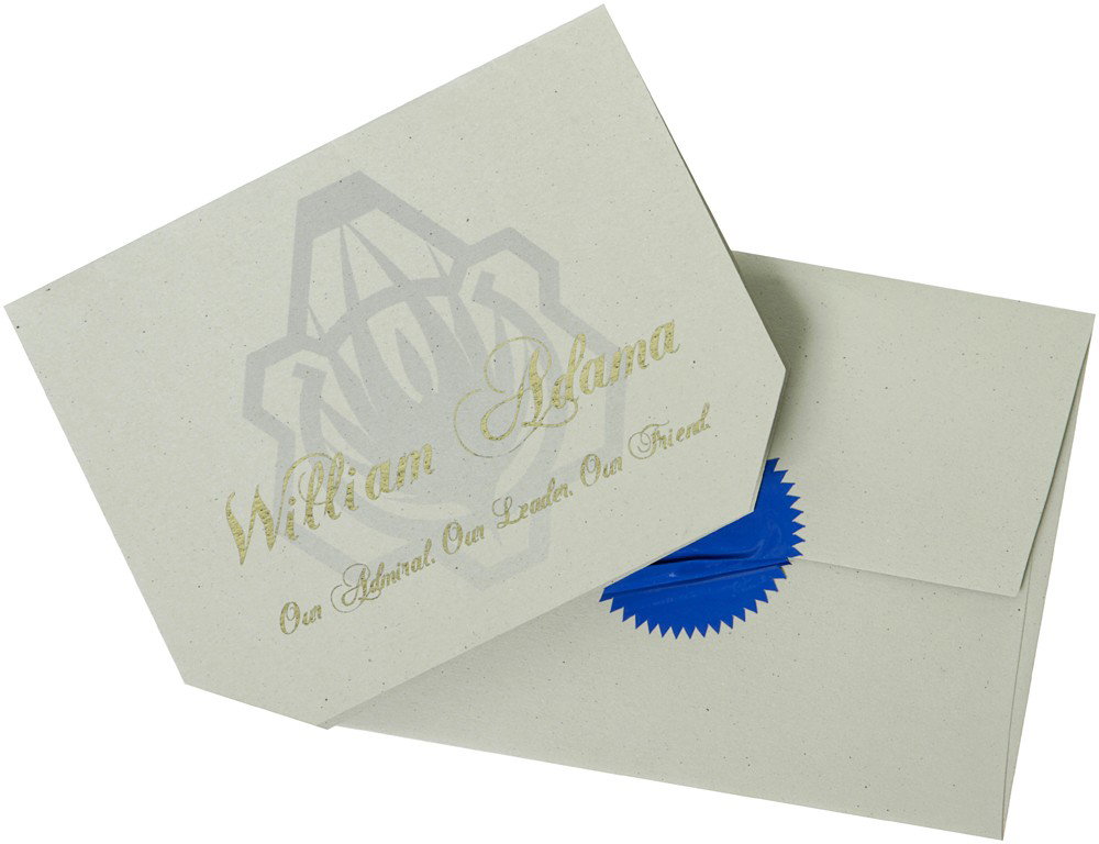 Battlestar Galactica Adama's Ceremony Invitation : Production Description: The invitation to an awards ceremony that President Roslin (Mary McDonnell) hands Admiral Adama (Edward James Olmos) after he gives her his resignation while on Colonial One in
