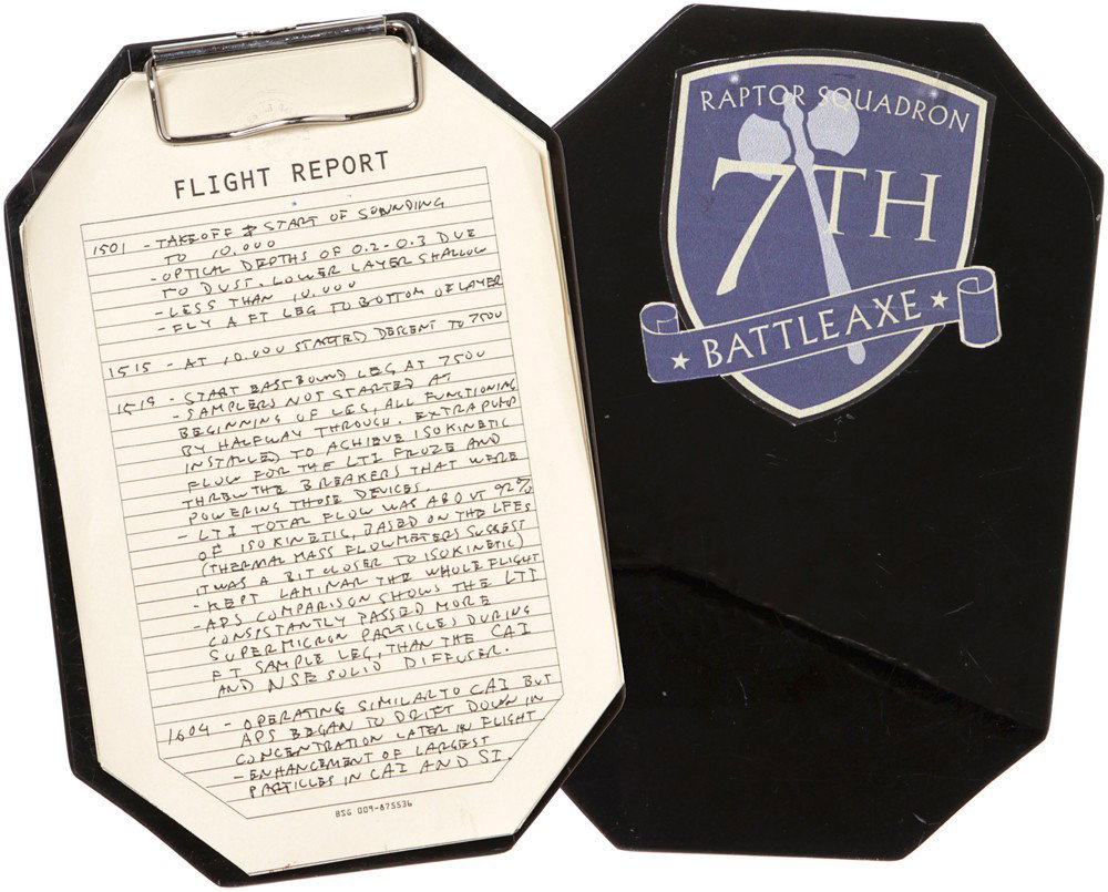Battlestar Galactica 7th Raptor Squadron Clipboard: Production Description: Pilots aboard the Galactica carried these clipboards to prep for flights or to use in briefings. This clipboard once belonged to a pilot from the 7th Raptors Battleaxe Squadron