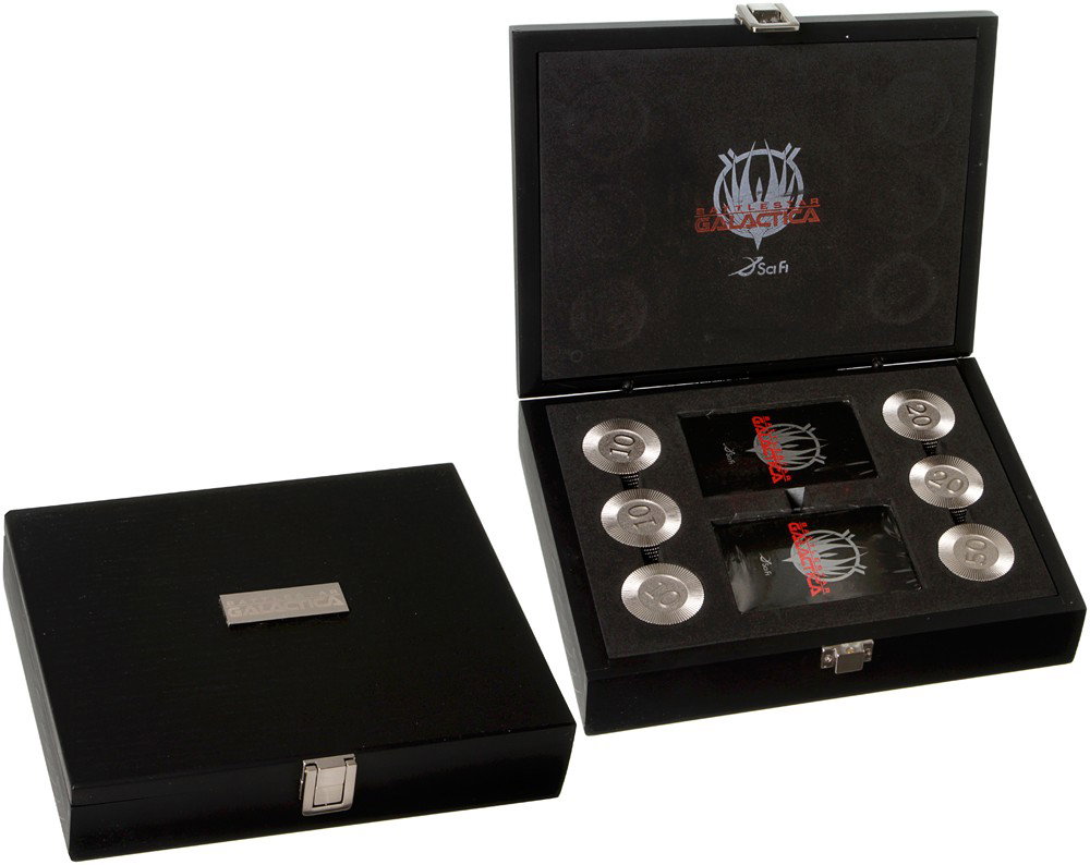 Battlestar Galactica Poker Set Crew Gift: Production Description: Complete poker set given out to a select few cast and crew members during the mini series. This rare set comes in a black wooden case with a silver metal plaque on top featurin