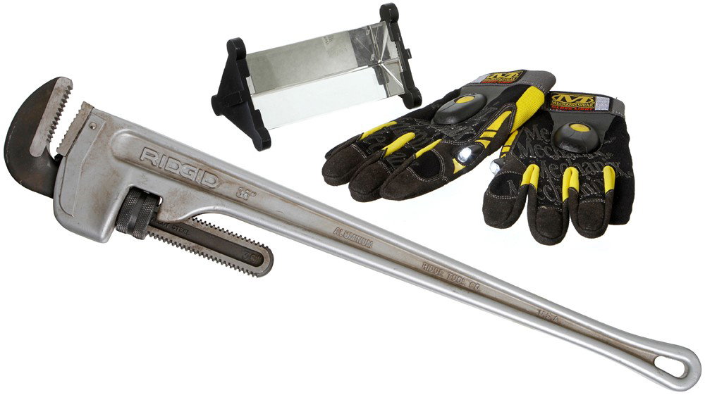 Iron Man 2 "Creating A New Element" Tools: Production Description: Hero tool set Tony Stark uses while creating a new element for his Arc Reactor. Set includes a pair of yellow gloves with LED lights on them, a large silver wrench, and a hero 