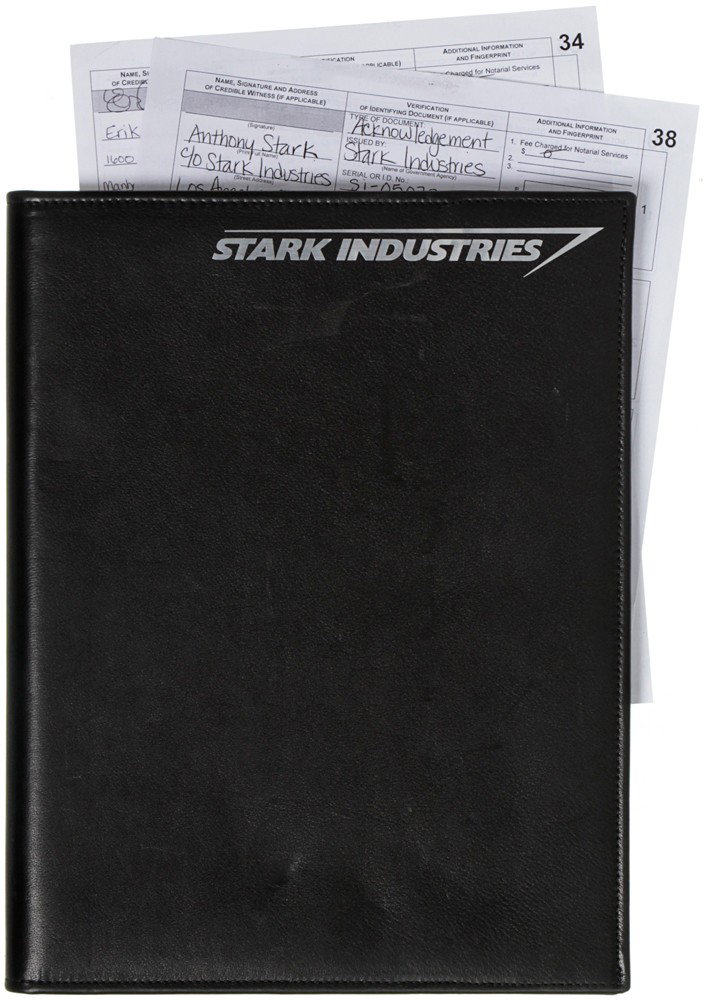 Iron Man 2 Hero Natalie Rushman Stark Folder: Production Description: Hero leather folder used by Natalie Rushman to get Tony's signature and thumb print to sign over the company to Pepper Potts. This item can be seen in the boxing scene between 