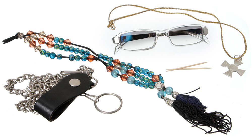 Iron Man 2 Ivan Vanko Hero Personal Items: Production Description: Ivan Vanko can be seen wearing and using these items thought the entire film. His personals consist of his hero glasses, worry beads, necklace, chain, and toothpicks. Productio